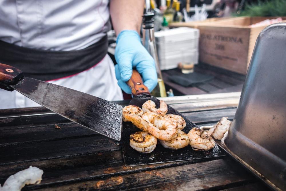 Chef grilling shrimps Chef grilling shrimps