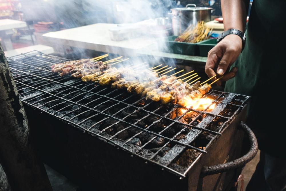 Grilling chicken satay Grilling chicken satay