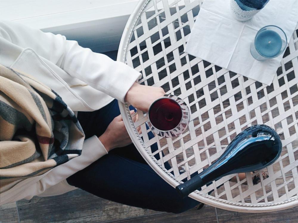 Lady drinking a glass of red wine Lady drinking a glass of red wine