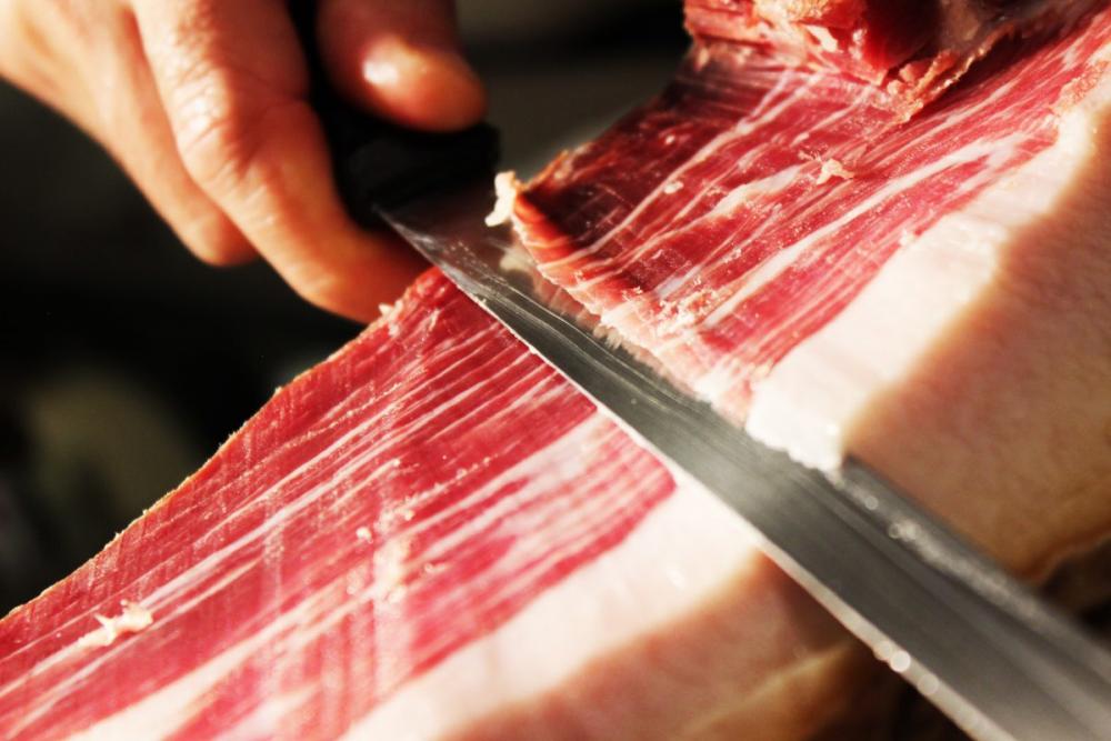 Cutting Spanish ham Cutting Spanish ham