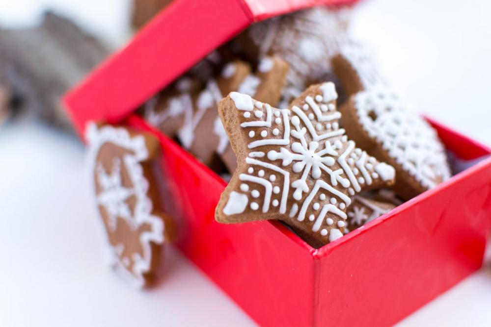 Traditional Christmas gingerbreads in a red paper box Traditional Christmas gingerbreads in a red paper box
