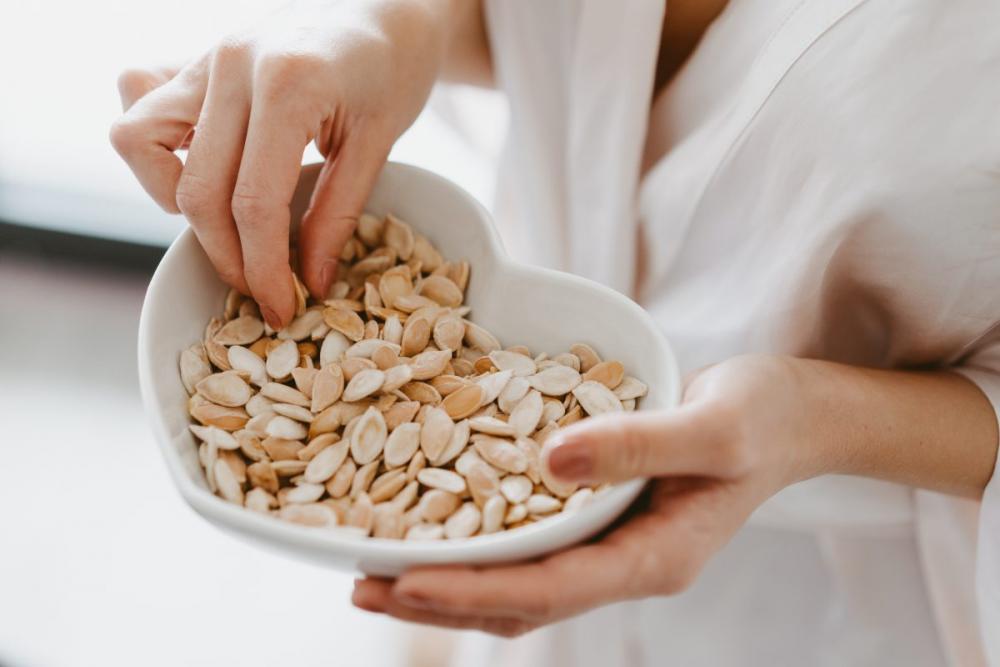 Eating Roasted Pumpkin Seeds