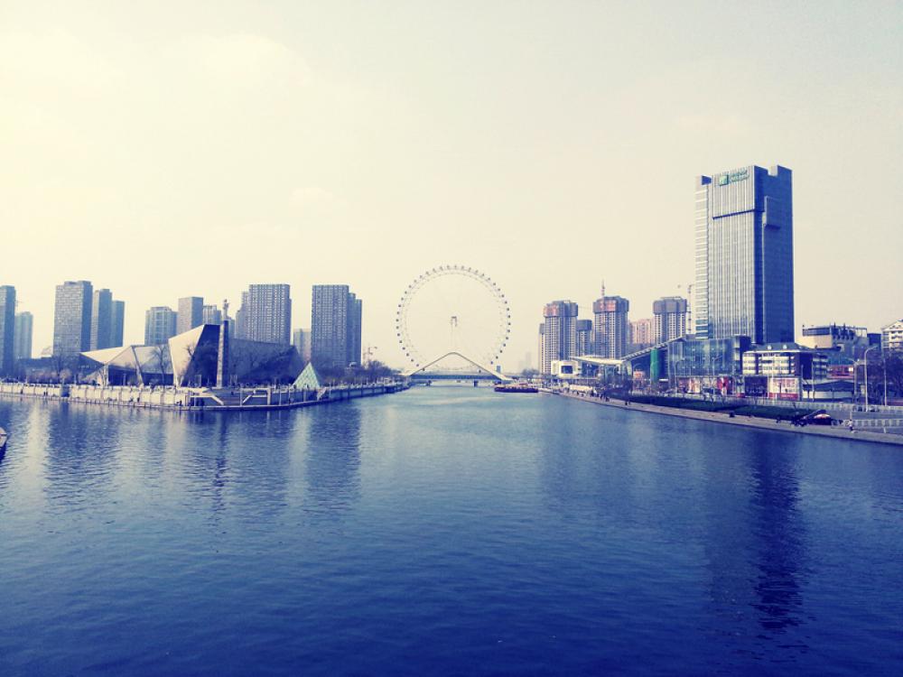 Skyline with Ferris Wheel in Tianjin, China free photo Skyline with Ferris Wheel in Tianjin, China free photo