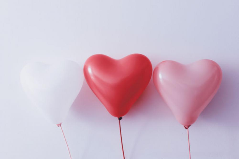 Three balloons in the shape of a heart. Beautiful Valentine’s Day Three balloons in the shape of a heart. Beautiful Valentine’s Day