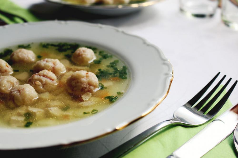 Traditional Czech soup with dumplings Traditional Czech soup with dumplings