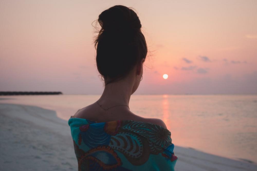 Woman on the Beach at Sunset Woman on the Beach at Sunset