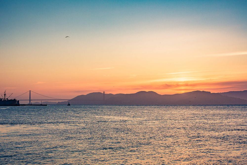 Beautiful Colorful Sunset with Ocean and Golden Gate Bridge Beautiful Colorful Sunset with Ocean and Golden Gate Bridge