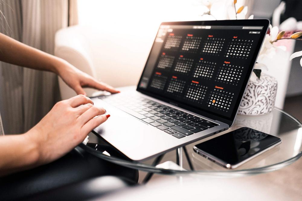 Freelance Woman Working on Her MacBook Freelance Woman Working on Her MacBook