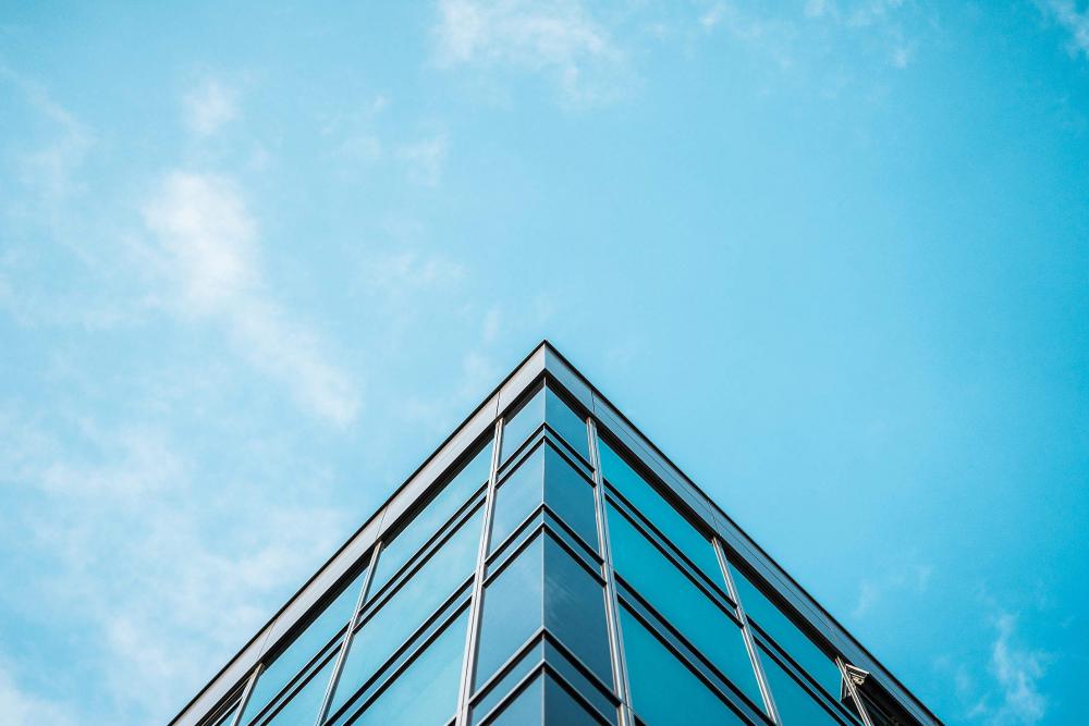 Business Skyscraper Office Building and Blue Sky Business Skyscraper Office Building and Blue Sky