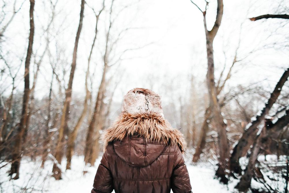 Girl Walking in Snowy Forest Girl Walking in Snowy Forest