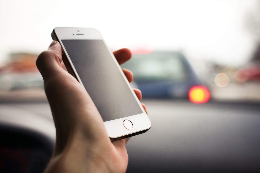 Another Hand with an iPhone 5S Another Hand with an iPhone 5S