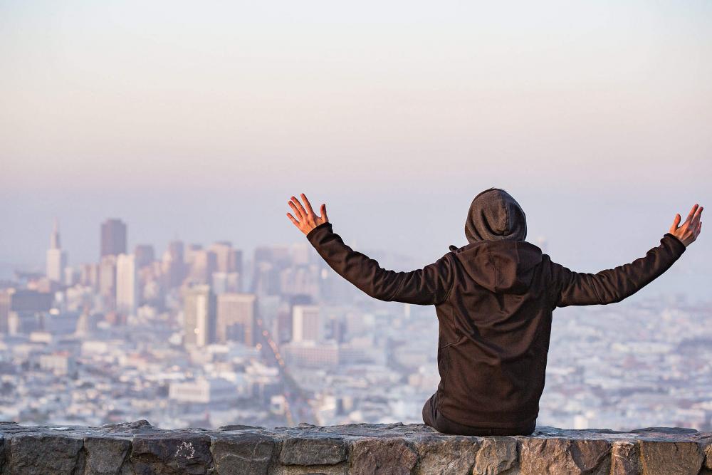 Man with Open Arms Saluting the San Francisco City Man with Open Arms Saluting the San Francisco City