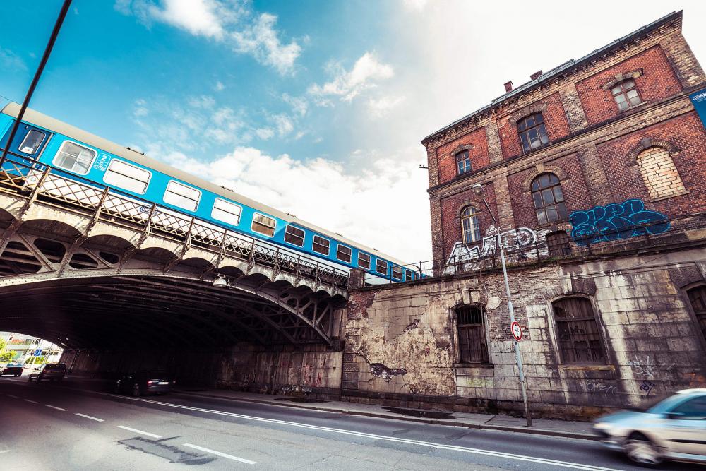 Old Abandoned Building with Steel Railway Bridge Old Abandoned Building with Steel Railway Bridge
