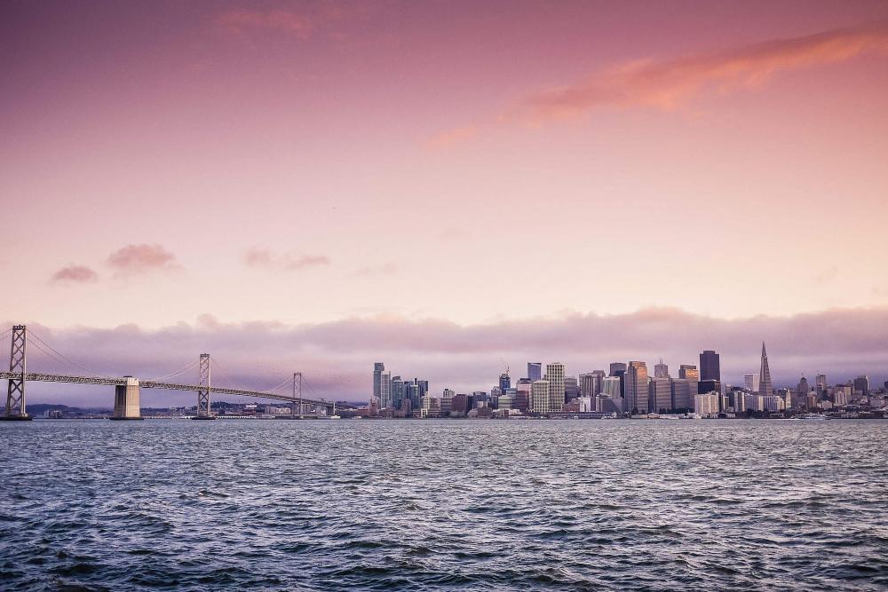 San Francisco Evening Skyline and Bay Bridge at Sunset San Francisco Evening Skyline and Bay Bridge at Sunset