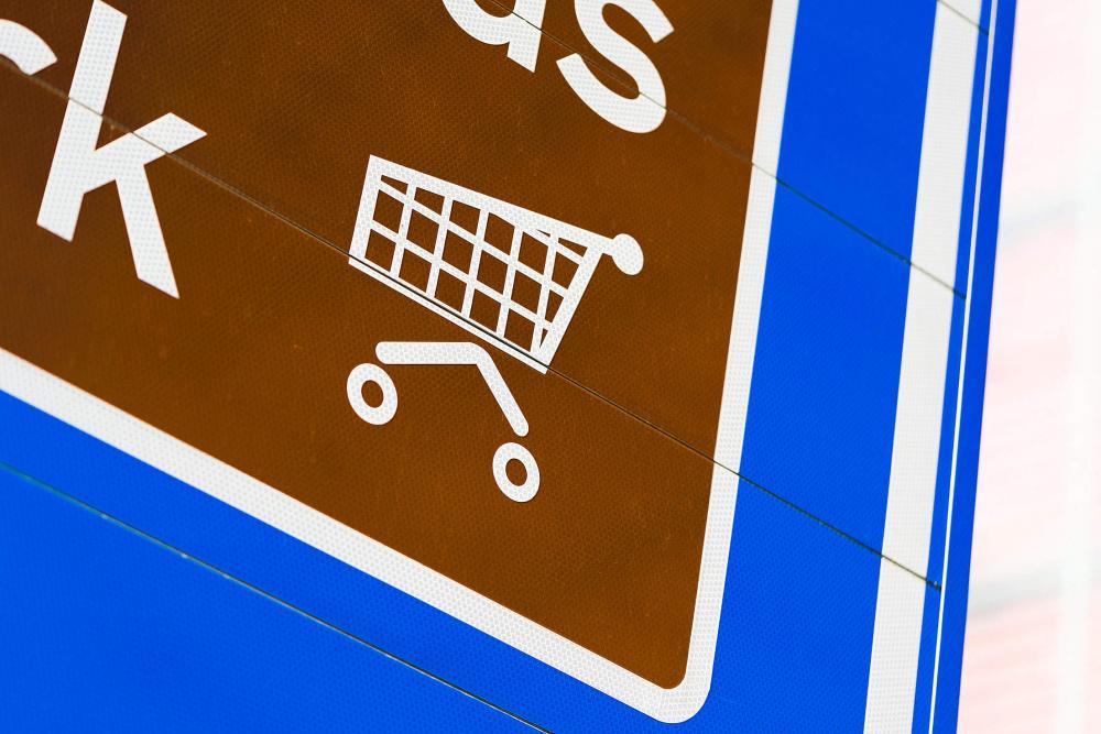 Shopping Cart Icon on Road Sign Shopping Cart Icon on Road Sign
