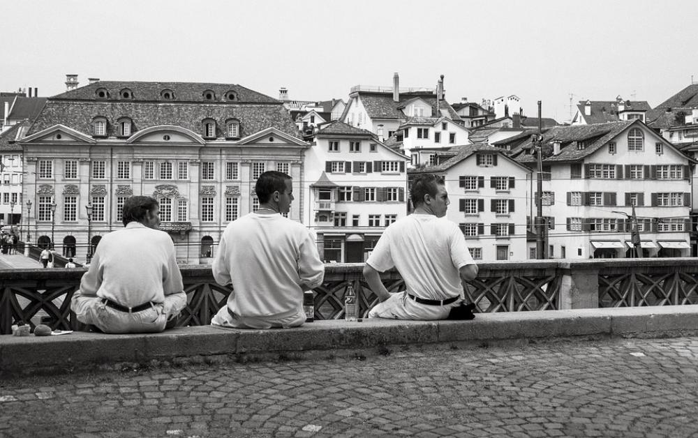 Men Sitting Waiting Wall Urban City Walkway Men Sitting Waiting Wall Urban City Walkway