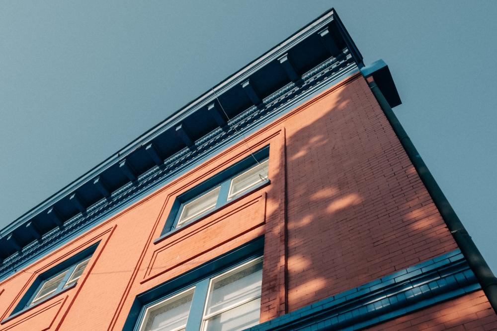 Brick Building With Blue Detail Photo Brick Building With Blue Detail Photo