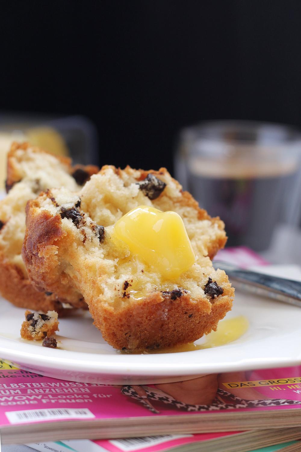 Butter Melting On Warm Muffin Over Coffee And Magazines Photo Butter Melting On Warm Muffin Over Coffee And Magazines Photo