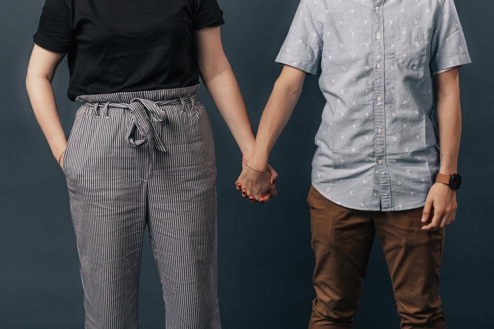 Couple Side By Side Holding Hands Photo Couple Side By Side Holding Hands Photo