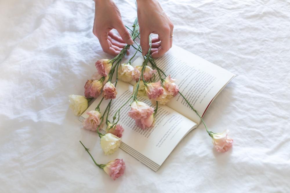 Flowers On A Book Photo Flowers On A Book Photo