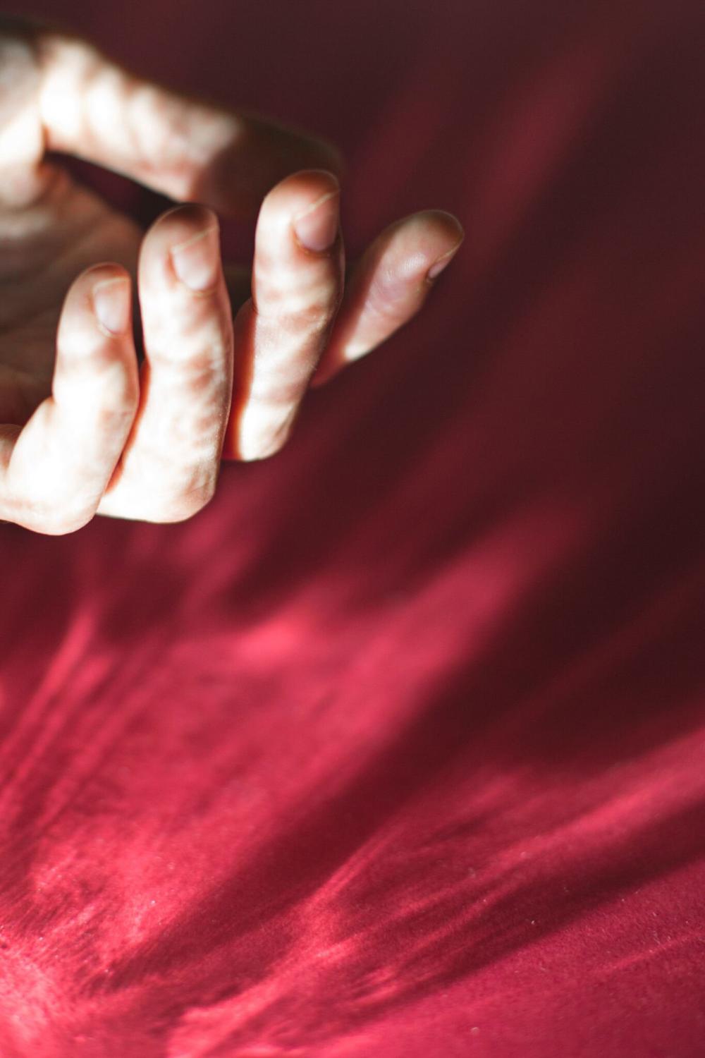 Hand In Light On Red Photo Hand In Light On Red Photo