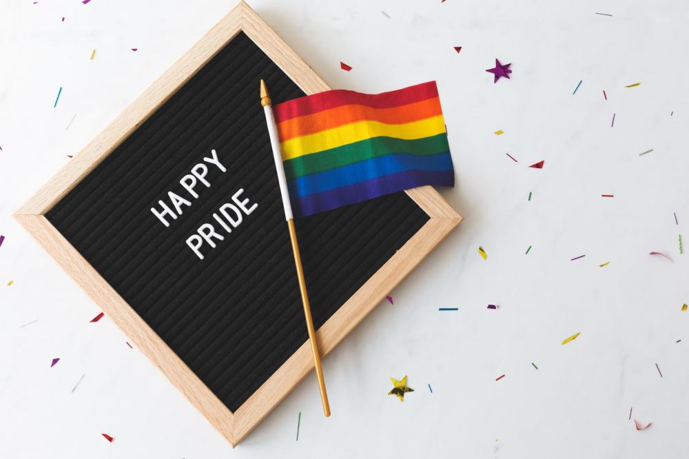 Happy Pride Sign With Flag Photo Happy Pride Sign With Flag Photo