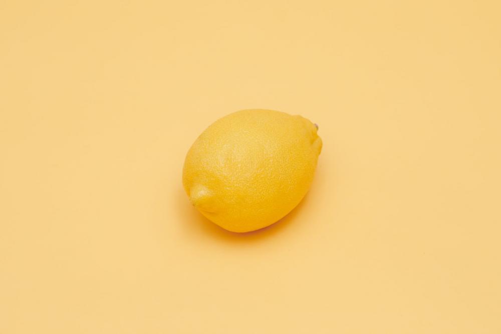 Lemon Fruit Yellow Background Photo Lemon Fruit Yellow Background Photo
