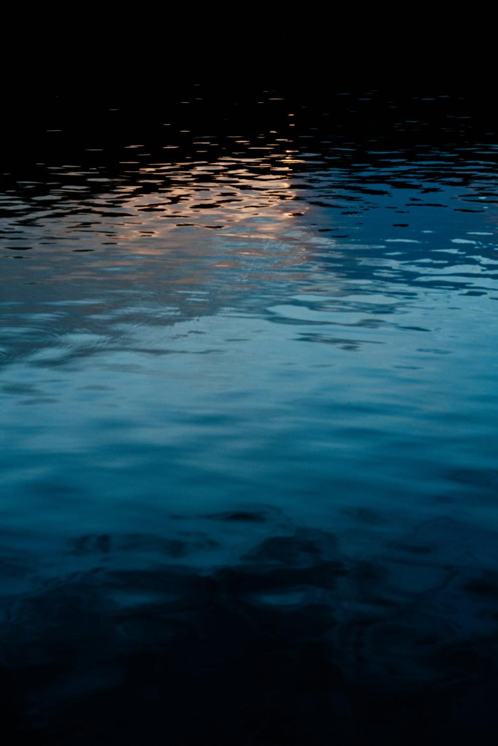 Light Reflects On Water Photo Light Reflects On Water Photo