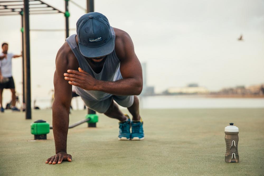 One Arm Push Up Photo One Arm Push Up Photo