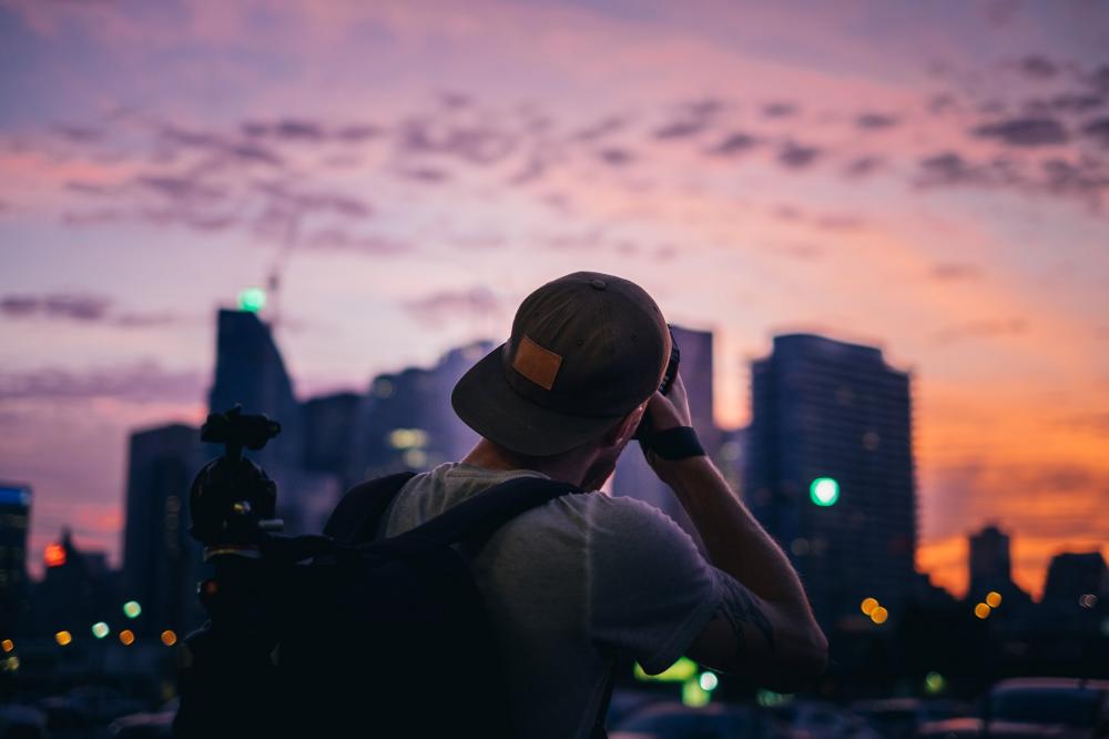 Photographer Shooting City Sunset Photo Photographer Shooting City Sunset Photo