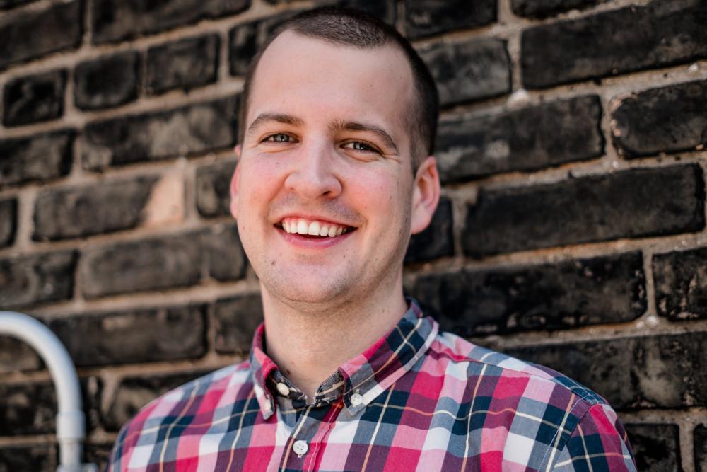 Portrait Of A Young Man Smiling Photo Portrait Of A Young Man Smiling Photo