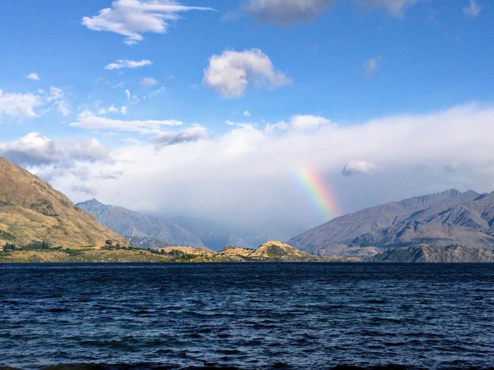 Rainbow Reaches For Clouds By Shore Photo Rainbow Reaches For Clouds By Shore Photo