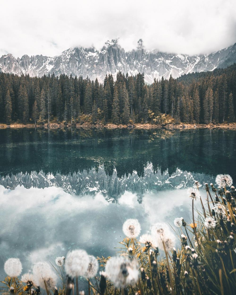 Snowy Mountains Reflected In Still Lake Photo Snowy Mountains Reflected In Still Lake Photo