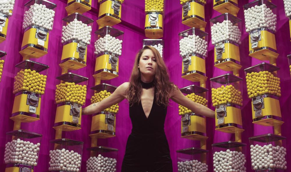Woman With Arms Outstretched Into Gumball Machines Photo Woman With Arms Outstretched Into Gumball Machines Photo