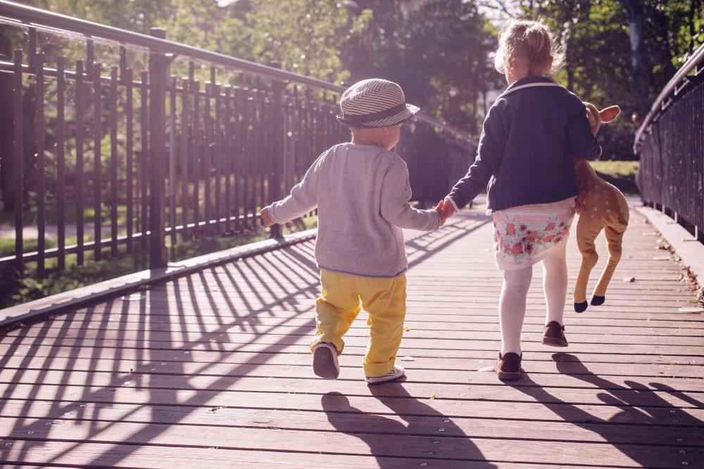 Kids running across the bridge Kids running across the bridge