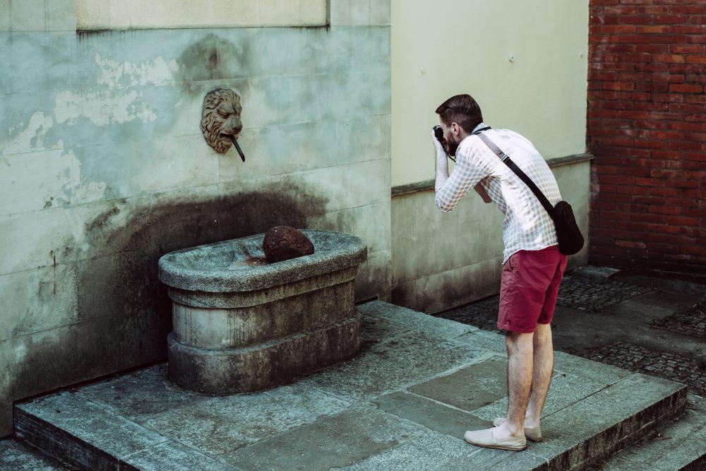 Male tourist taking a picture Male tourist taking a picture