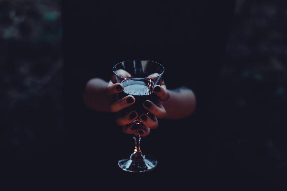 A witch holding a glass of wine 2 A witch holding a glass of wine 2