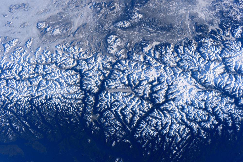 Mountains flyover on the International Space Station in British Columbia, Canada free photo Mountains flyover on the International Space Station in British Columbia, Canada free photo