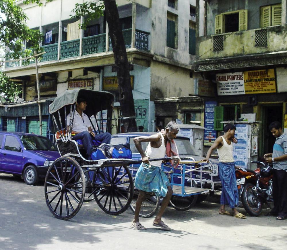 Riksha in the road in Calcutta, India free photo Riksha in the road in Calcutta, India free photo
