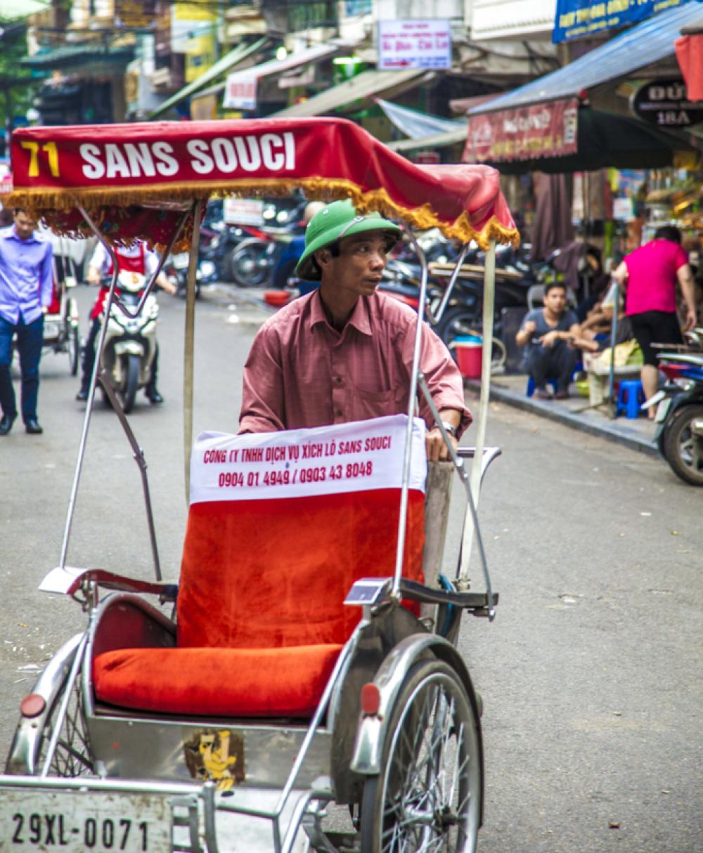 Traditional cyclo in Hanoi, Vietnam free photo Traditional cyclo in Hanoi, Vietnam free photo