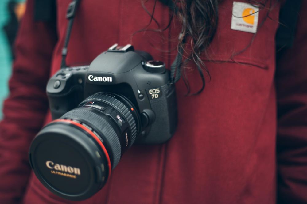 Women wearing Canon 7D Camera free photo Women wearing Canon 7D Camera free photo