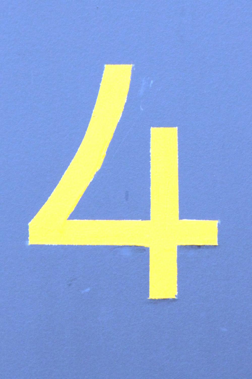 Yellow 4 on blue background free photo Yellow 4 on blue background free photo