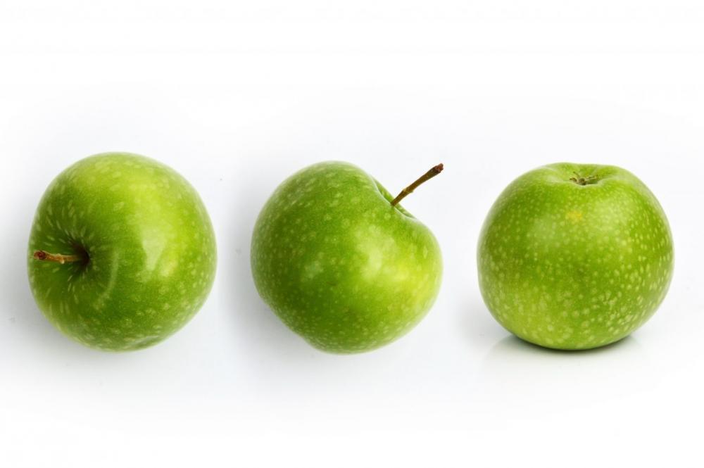 Green Apples on Table Green Apples on Table