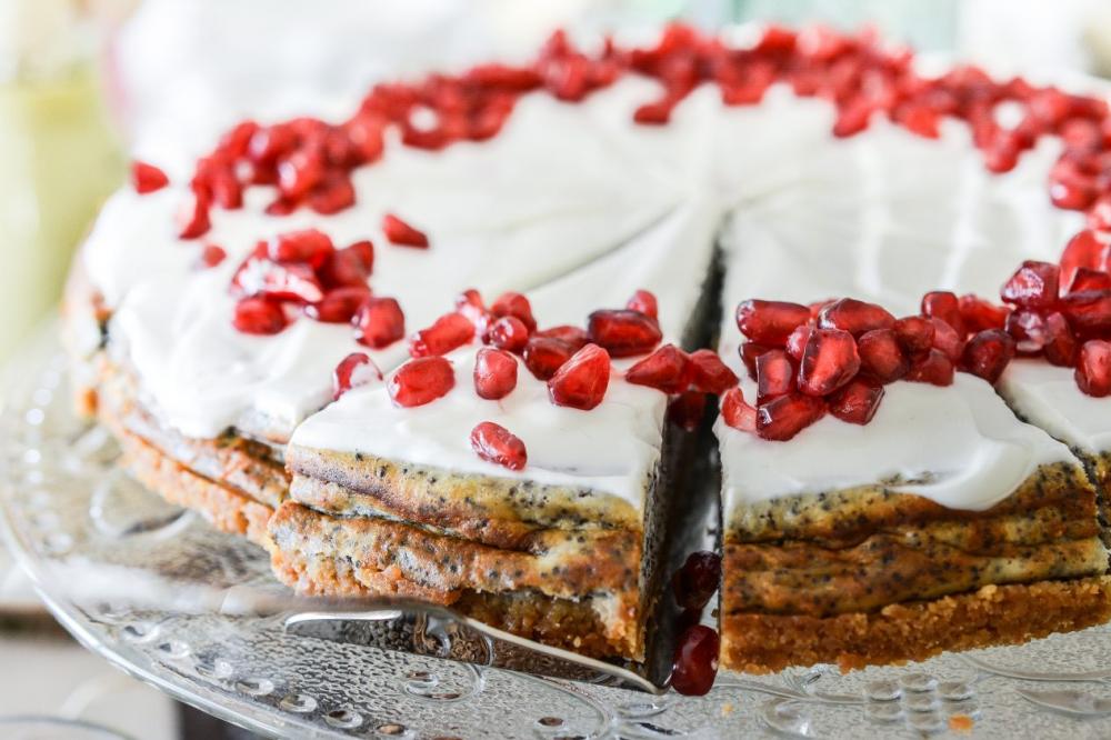Poppy cake with pomegranate on the top Poppy cake with pomegranate on the top