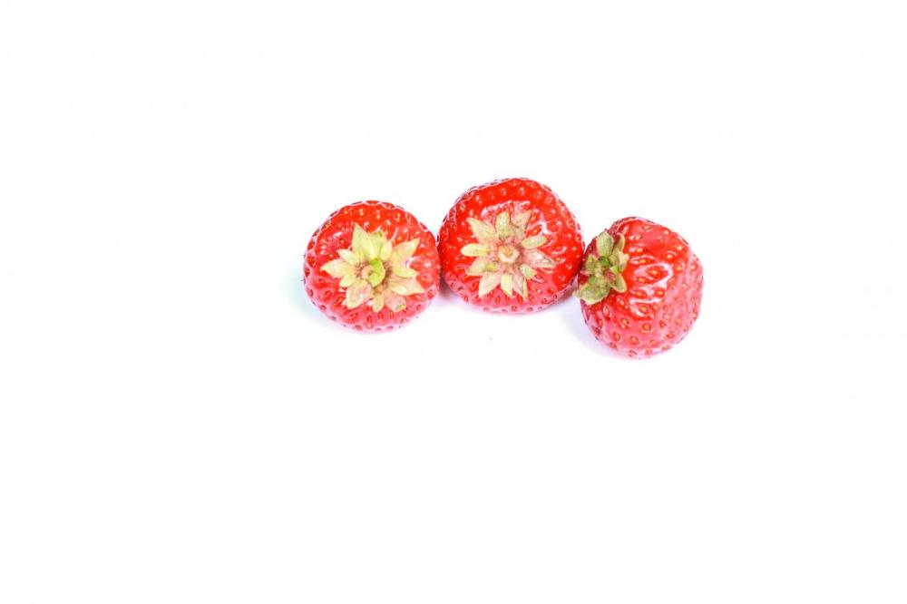 Three strawberries on white background Three strawberries on white background
