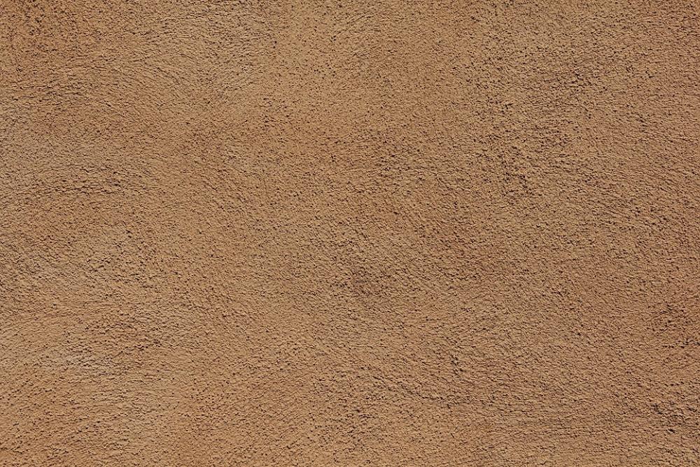 Adobe Wall Texture Brown Background Plaster Nubby Adobe Wall Texture Brown Background Plaster Nubby
