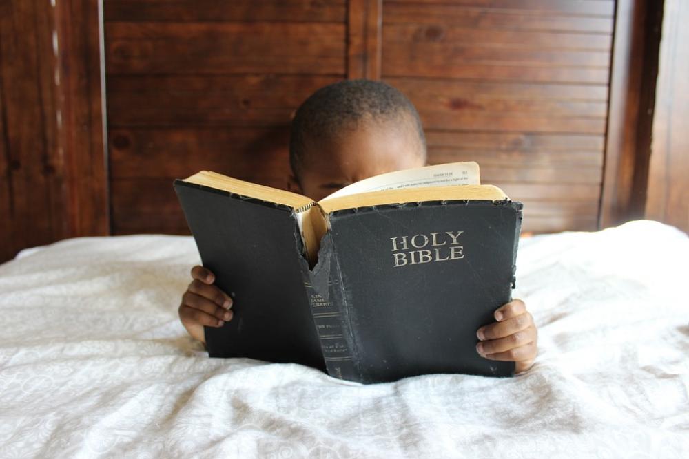 Child Reading Bible Bed African Education Boy Child Reading Bible Bed African Education Boy