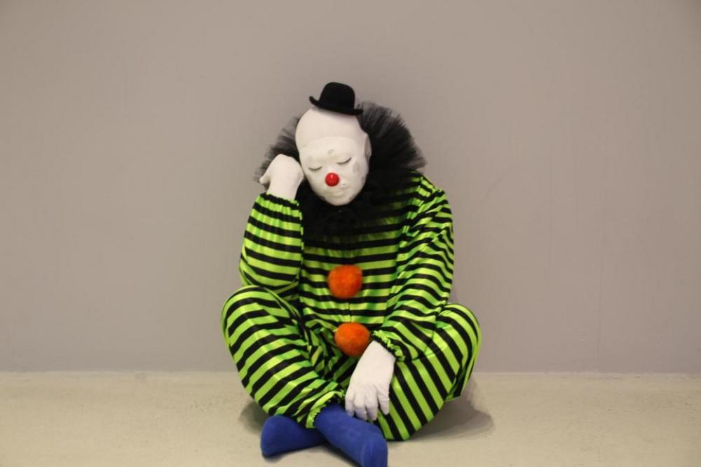 clown green blue socks black hat sleeping clown green blue socks black hat sleeping