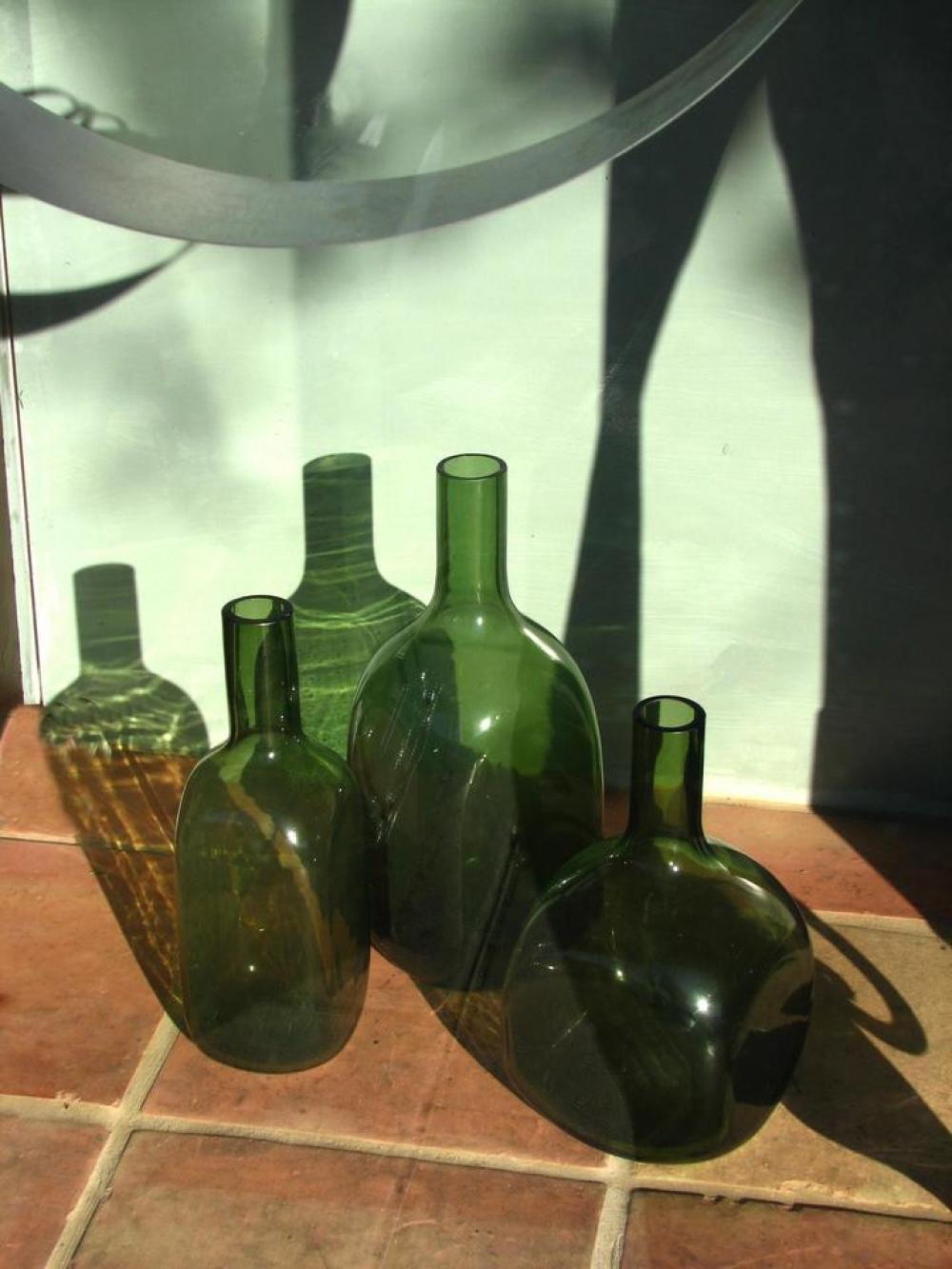 bottles green glass still life shadows bottles green glass still life shadows