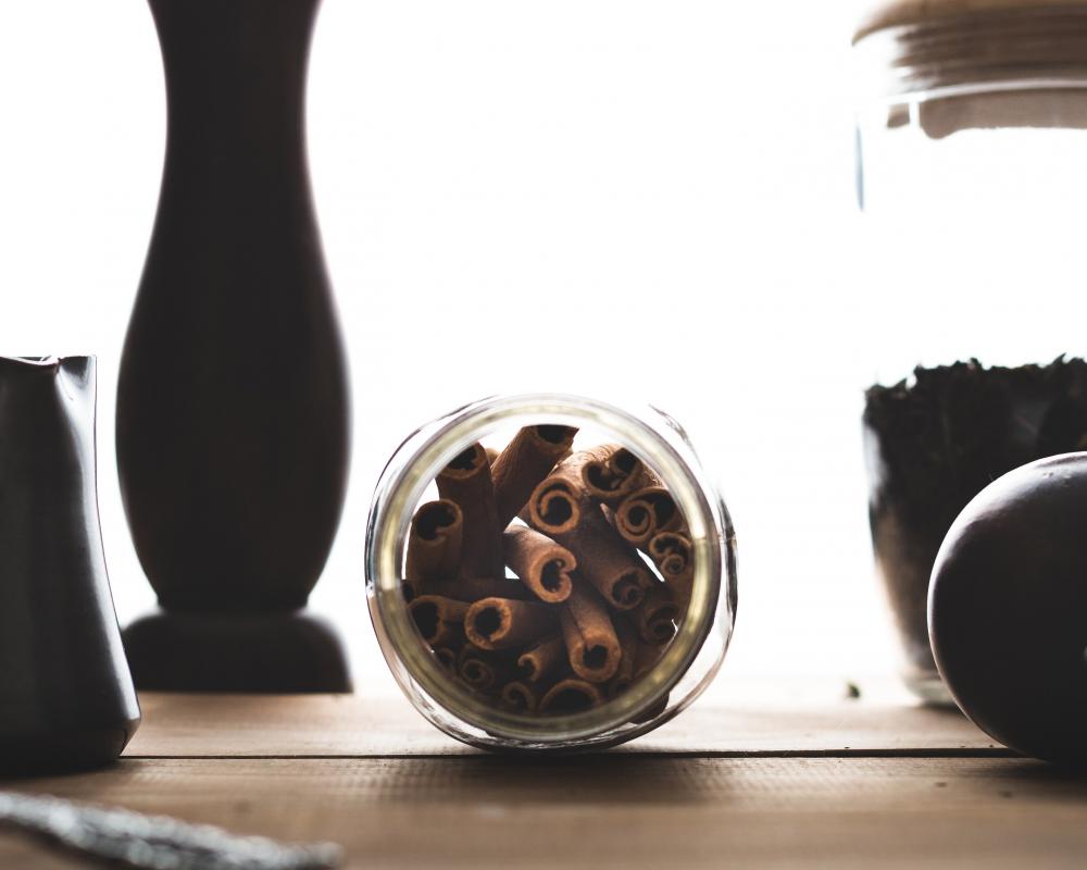 Cinnamon sticks in a glass jar Cinnamon sticks in a glass jar